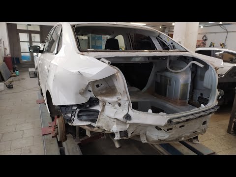 Видео: Ремонт сильно завернутого задка после ДТП. Volkswagen Polo.