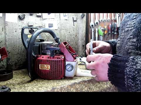 Видео: Бензопила Мотор Січ  470 /Погано заводиться на холодно/ Віддача в руку від стартера / Серія №1