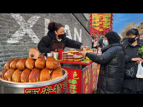 Видео: Оживлённый рынок в Сиане, Китай! Традиционная еда, насыщенные вкусы и живая атмосфера