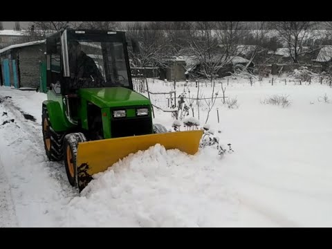 Видео: Завел трактор в -15, чищу снег....