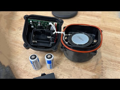 Видео: BMW E60: замена батареи модуля сирены