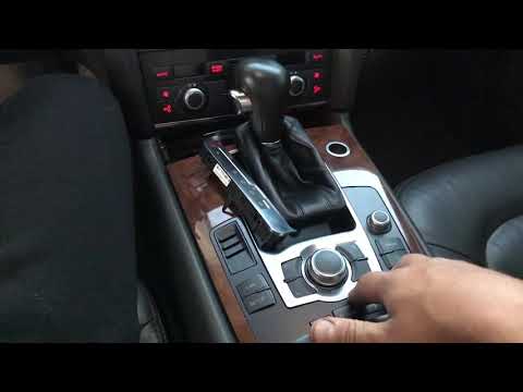 Видео: Как розобрать консоль mmi на Audi Q7