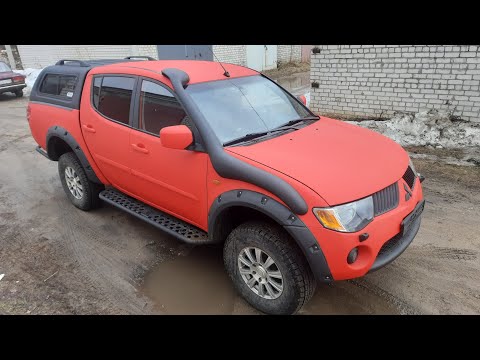 Видео: Яркая Mitsubishi L200 в защитном покрытии "RAPTOR"