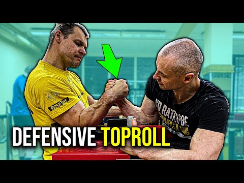 Видео: Защитные приёмы верхового броска в армрестлинге: экспертное руководство Яниса Амолинса