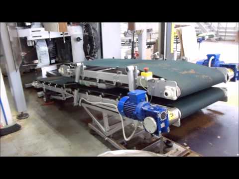 Видео: Дозирование и упаковка торфа на упаковочной машине Бестром-600