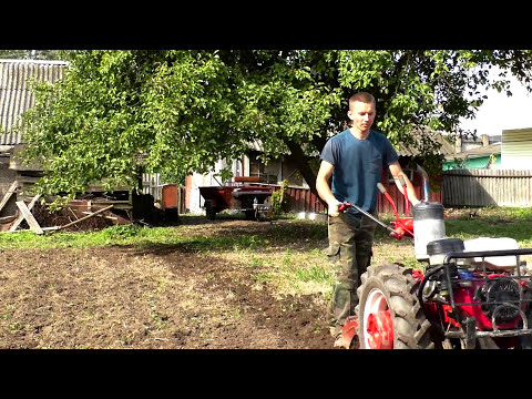 Видео: Фрезеровка земли на больших колесах