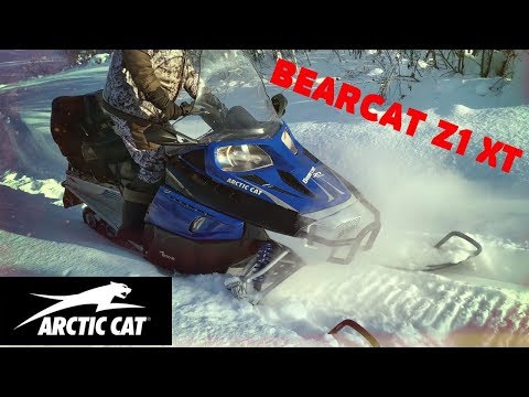 Видео: Обзор снегохода ARCTIC CAT BEARCAT Z1 XT 2009. Часть 1. Начало весны в Якутии.