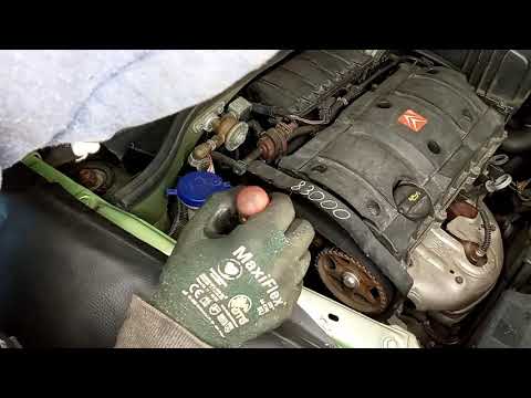 Видео: Замена комплекта ГРМ и помпы Citroen C3 1.6 i 16v