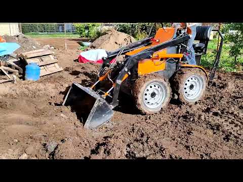 Видео: мини погрузчик работа лето 2024