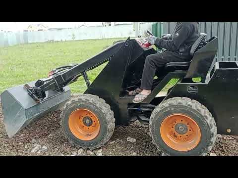Видео: YTM мини погрузчик в дорожных работах.