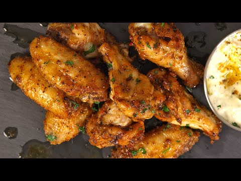 Видео: Праздничные крылышки — острые лимонно-тимьяновые влажные крылышки