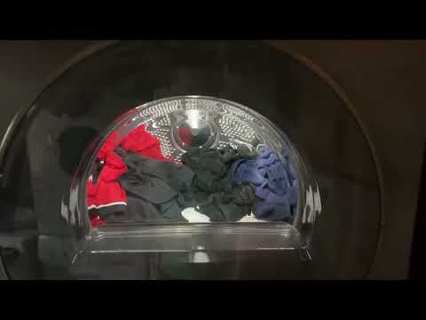 Видео: Загрузка и запуск сушильной машины Asko в первый раз