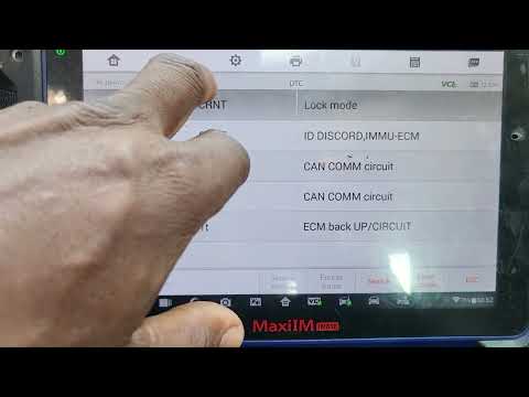 Видео: Замена и программирование компьютера двигателя Nissan Altima 2007 года с помощью Autel 608: что в...