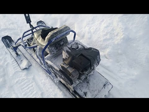 Видео: Снегоход "Хаски" проблемы с фильтром.
