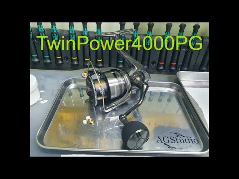 Видео: Shimano 24 Twin Power 4000PG обзор/разбор Сравнение ГП с 20 TwinPower