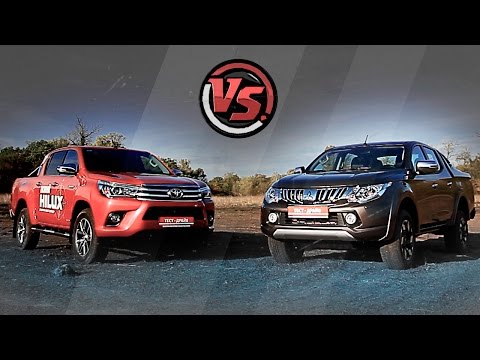 Видео: Toyota Hilux VS Mitsubishi L200. "2 Лошадиные силы"