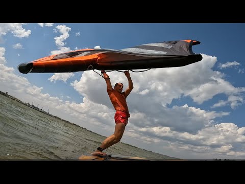 Видео: На сапборде с вингом