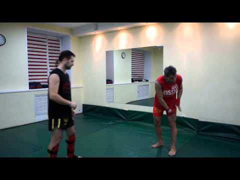 Видео: Ушу-Саньда:Защита от ударов"лоу-кик и мидл-кик с броском" в "Цзуй Цюань"