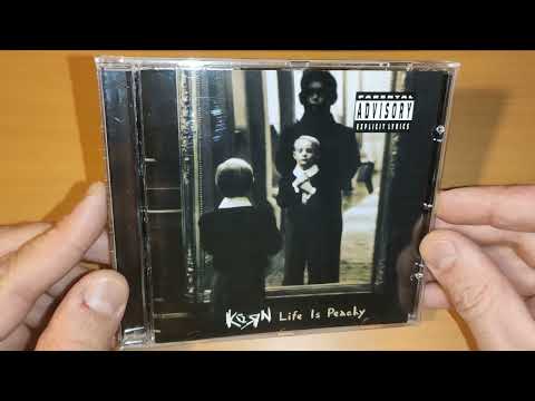 Видео: Обзор оформления CD альбома Korn  - Life Is Peachy