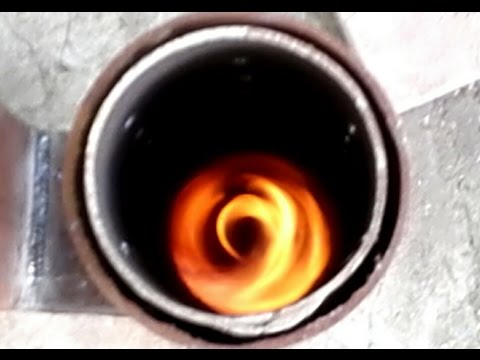 Видео: ROCKET WOOD BURNING STOVE 1 РАКЕТНАЯ ЭКОНОМ ПЕЧЬ ДЛЯ ГАРАЖА, МАСТЕРСКОЙ