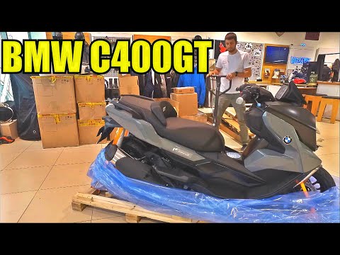 Видео: Распаковка BMW C400GT. Достаем из коробки новый макси скутер БМВ