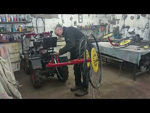 Видео: крепим грабли солнышко к мототрактору