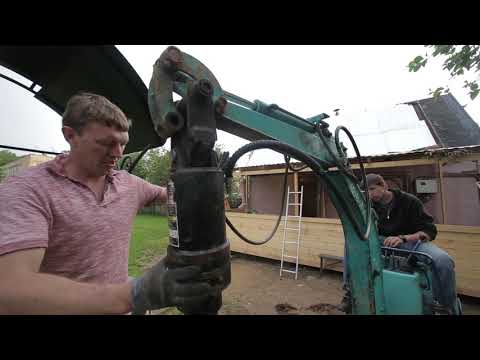 Видео: mini excavator 8 обзор Kubota K008 / крутим сваи / подключаем бур / шнек 300 мм