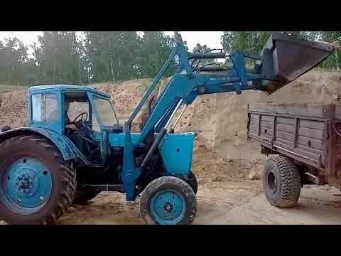 Видео: #как#мтз50#грузит#песок##Мтз погрузка песка.