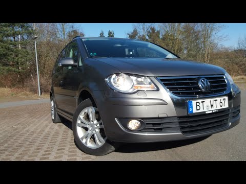 Видео: Обзор VW Touran 2.0 TDI 140 л.с. 2009 года