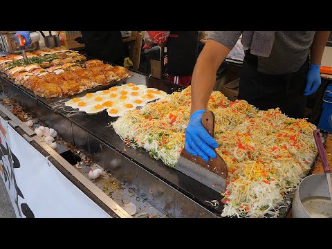 Видео: приготовление яичных блинов в японском стиле на фестивале - японская уличная еда