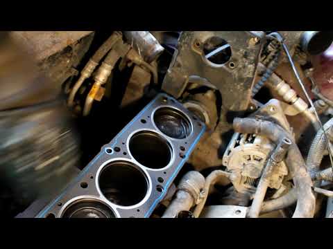 Видео: Замена прокладки ГБЦ и маслосъёмных колпачков Chevrolet Lanos