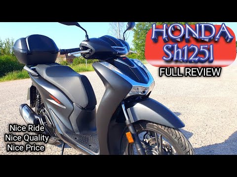 Видео: Honda Sh125i: Обзор