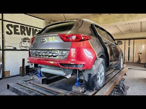 Видео: Kia Sportage.  Рихтовка.