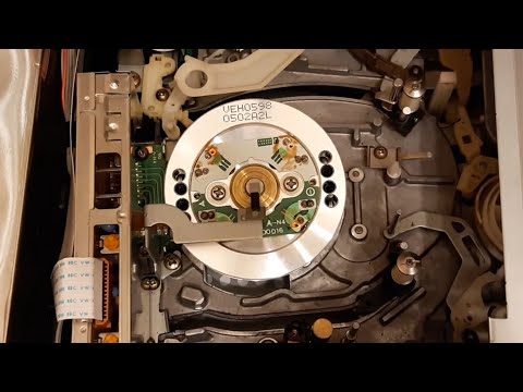 Видео: Замена верхнего барабана блока видео головки К-механизм  Panasonic NV-SD20.