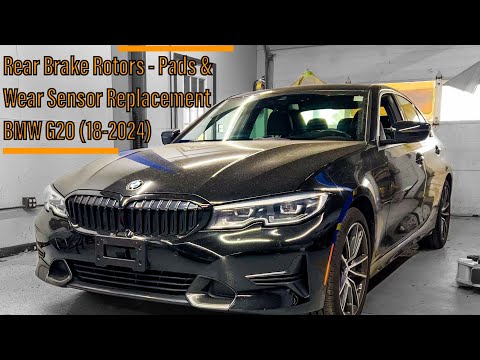 Видео: Замена задних тормозных колодок, роторов и датчика износа BMW 3 серии - G20 - (2018-2024)