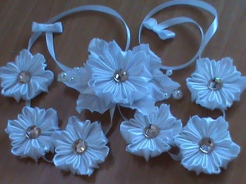 Видео: Нарядная лента в косу с необычными ромашками канзаши к 1 сентября