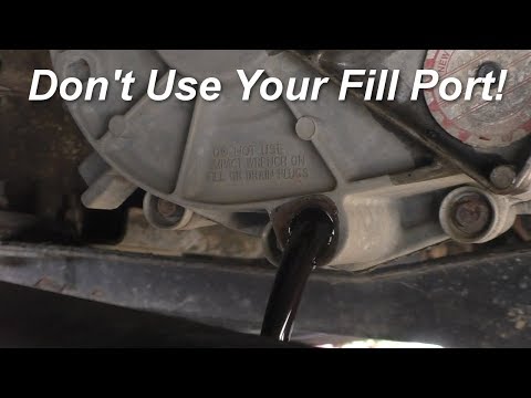 Видео: Как заменить жидкость в раздаточной коробке в грузовике Duramax или полноразмерном грузовике GM