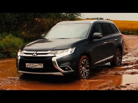 Видео: Проверим в поле и на плохих дорогах! Mitsubishi Outlander (Мицубиси Аутлендер) тест-драйв на ходу