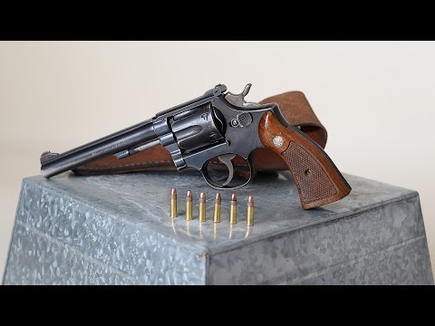 Видео: Стрельба из Smith & Wesson K-22