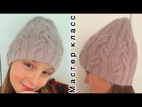 Видео: Вязаная шапка с аранами. Мастер класс