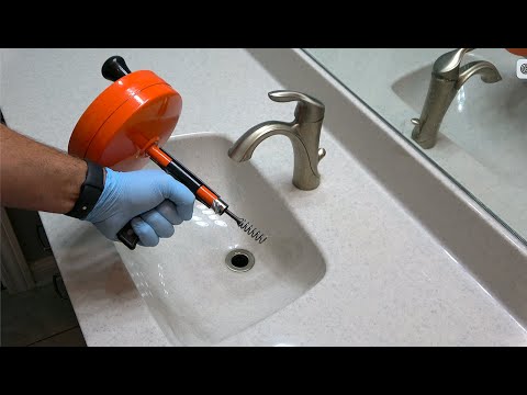 Видео: Как прочистить раковину в ванной с помощью троса для прочистки слива — Ridgid Power Spin