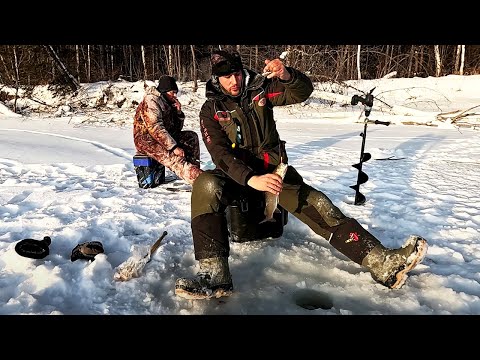Видео: Зимняя рыбалка в Сибири. В тайгу на буране за ленком и тайменем. Ловля ленка  и тайменя зимой.