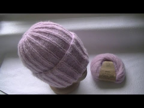 Видео: Вязание шапки спицами.