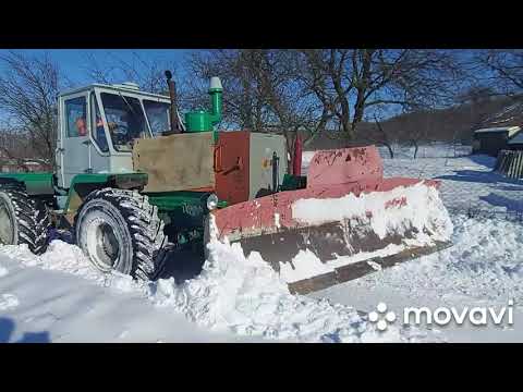 Видео: чистим снег трактор т 150 2021