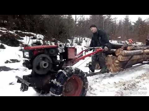 Видео: Мотоблок12 кс лебідка в роботі