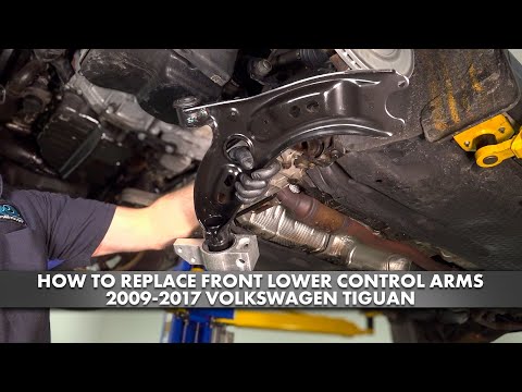 Видео: Как заменить передние нижние рычаги подвески Volkswagen Tiguan 2009-2017