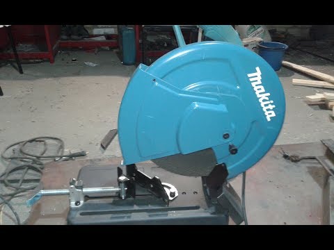 Видео: Минусы отрезного станка Makita 1401