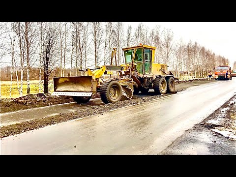 Видео: Автогрейдер CAT и SDLG на укреплении обочины.