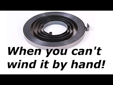 Видео: Самый простой способ установки пружины ручного стартера