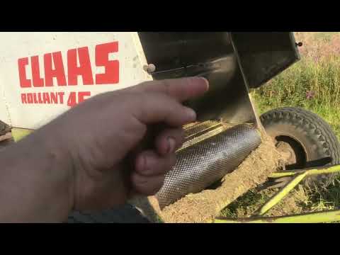 Видео: прее подборщик claas 46 почему не крутит рулон и размеры скатной доски!
